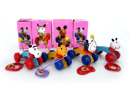 dřevěné tahací zvířátko - na foto 4.